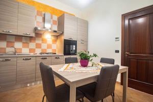 Kuchyň nebo kuchyňský kout v ubytování Casa Vacanza Puntaferano