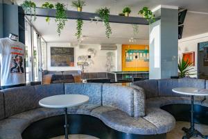 A kitchen or kitchenette at Hotel Morfeo - Young People Hotels