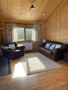 Prostor za sedenje u objektu Rural Wood Cabin - less than 3 miles from St Ives