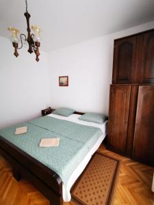 Łóżko lub łóżka w pokoju w obiekcie Rooms Silvana