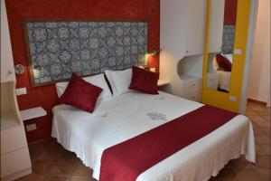 Postel nebo postele na pokoji v ubytování Donna Carmela - Da Rosa
