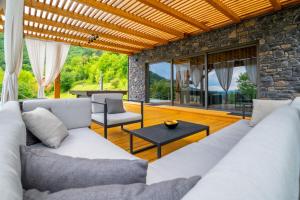Posedenie v ubytovaní Holiday Home Wellspring