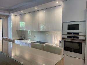 Kuchyň nebo kuchyňský kout v ubytování Marbella playa Residencial con piscina