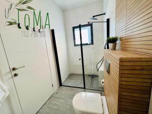 Koupelna v ubytování LOMA