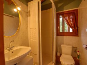a bathroom with a sink and a toilet and a shower at Chalet Morillon Village, 3 pièces, 7 personnes - FR-1-642-42 in Morillon