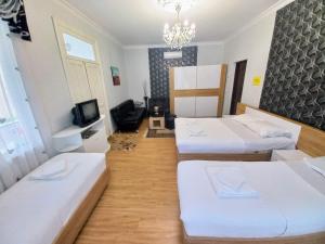 Postel nebo postele na pokoji v ubytování ApartHotel RioNi