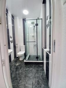 Koupelna v ubytování ApartHotel RioNi