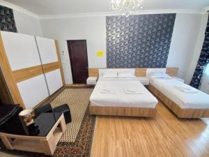 Postel nebo postele na pokoji v ubytování ApartHotel RioNi