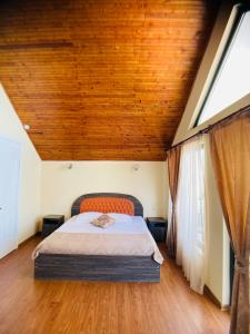 Säng eller sängar i ett rum på Hotel Tramonto
