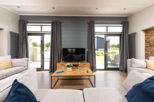 Posezení v ubytování Primrose Lodge, 25 Roadford Lake Lodges