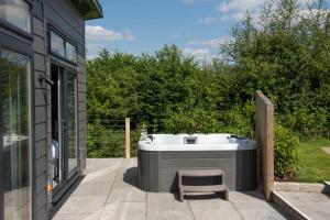 Fotografie z fotogalerie ubytování Primrose Lodge, 25 Roadford Lake Lodges v destinaci Lifton