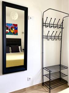 Ein Bett oder Betten in einem Zimmer der Unterkunft Pirata Milfontes Guest House