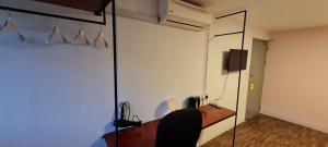 TV a/nebo společenská místnost v ubytování Misto Hotel