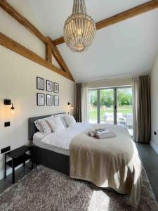 מיטה או מיטות בחדר ב-Lodge Barn Annexe