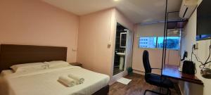 Postel nebo postele na pokoji v ubytování Misto Hotel