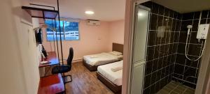 Postel nebo postele na pokoji v ubytování Misto Hotel
