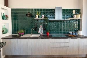 Kuchyňa alebo kuchynka v ubytovaní La Era Gran casa de vacaciones para grupos adaptad