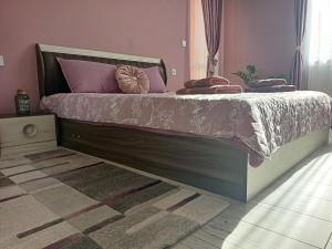Postel nebo postele na pokoji v ubytování Стоянови