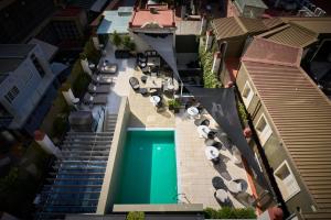 an overhead view of a swimming pool in a house at Catalonia Passeig de Gràcia 4* Sup in Barcelona
