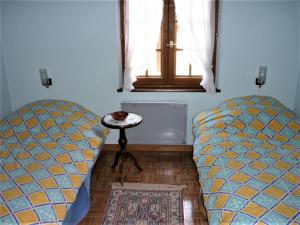 Postel nebo postele na pokoji v ubytování Gîte Hecker
