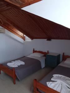 Postel nebo postele na pokoji v ubytování Oasis - Harbor House