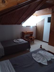 Postel nebo postele na pokoji v ubytování Oasis - Harbor House