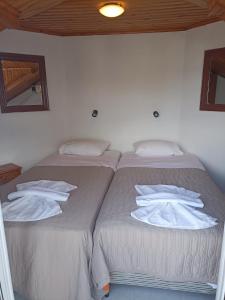 Postel nebo postele na pokoji v ubytování Oasis - Harbor House