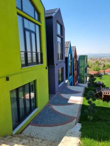 a row of colorful houses on a street at Kartepe LOFT in Kocaeli