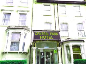 a building with a sign for a central park hotel at Central Park @ Finsbury Park in London