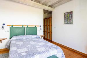 Postel nebo postele na pokoji v ubytování Casa con jardín cerca de la playa El porton