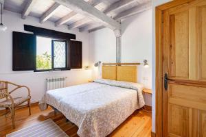 Postel nebo postele na pokoji v ubytování Casa con jardín cerca de la playa El porton