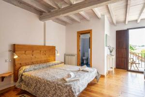 Postel nebo postele na pokoji v ubytování Casa con jardín cerca de la playa El porton