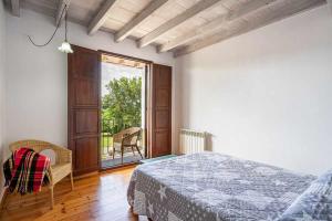 Postel nebo postele na pokoji v ubytování Casa con jardín cerca de la playa El porton