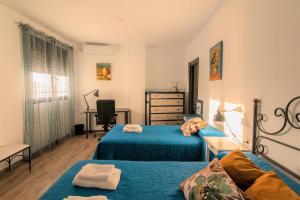 Posteľ alebo postele v izbe v ubytovaní La Era Gran casa de vacaciones para grupos adaptad