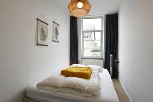 Un pat sau paturi într-o cameră la La petite Naimette
