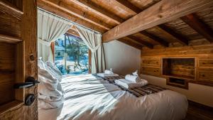 Posteľ alebo postele v izbe v ubytovaní Chalet Entre Nous