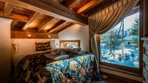 Posteľ alebo postele v izbe v ubytovaní Chalet Entre Nous