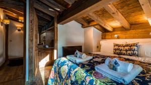Posteľ alebo postele v izbe v ubytovaní Chalet Entre Nous