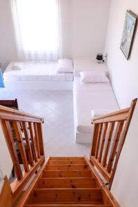 Letto o letti in una camera di Mykonos in White