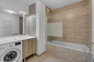 Een badkamer bij LE COSMOPOLIS - Charmant appartement toulousain de 89m2