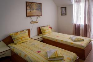 Postel nebo postele na pokoji v ubytování Kalypso Hotel