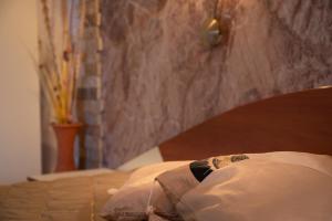 Postel nebo postele na pokoji v ubytování Kalypso Hotel