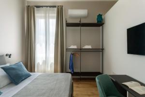 TV a/nebo společenská místnost v ubytování Mori's Rooms