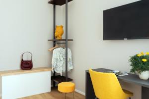 TV a/nebo společenská místnost v ubytování Mori's Rooms
