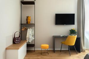 TV a/nebo společenská místnost v ubytování Mori's Rooms