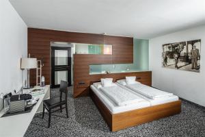 Postel nebo postele na pokoji v ubytování Geniesserhotel Rauter