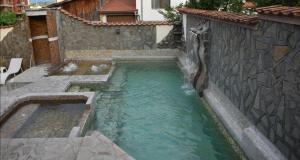 a small pool of water in a yard at Angel&MAR in Velingrad