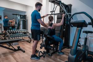Fitnes oz. oprema za telovadbo v nastanitvi Hotel Seven
