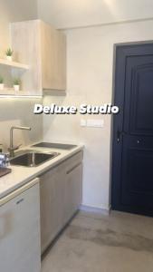 Kuchyň nebo kuchyňský kout v ubytování Diomare Villas