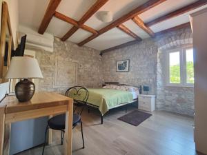 Postel nebo postele na pokoji v ubytování Boutique Hotel Castello Gulich